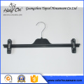 Black plastic pants hanger with clips